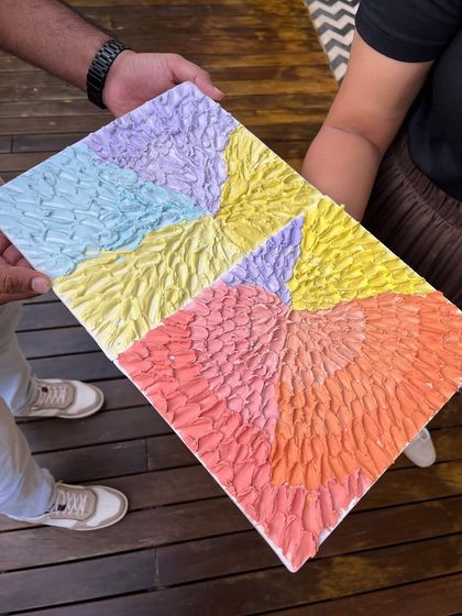 A close-up of a vibrant, multi-colored texture art piece. The way the light catches the different peaks and valleys is just beautiful.