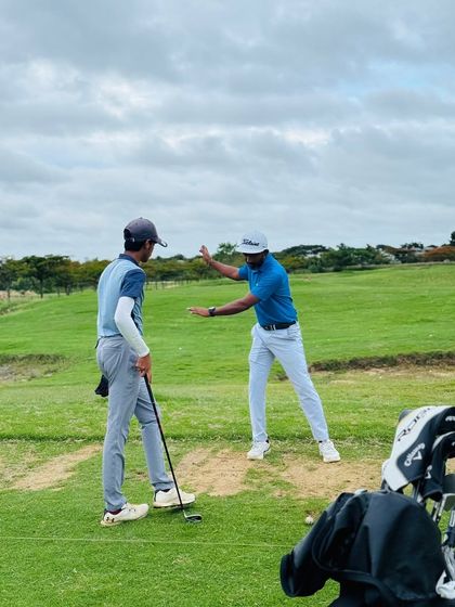 Our coaches are constantly on the range, providing hands-on instruction. From demonstrating a swing path to analyzing a student's setup, these moments of direct mentorship are where real progress is made.