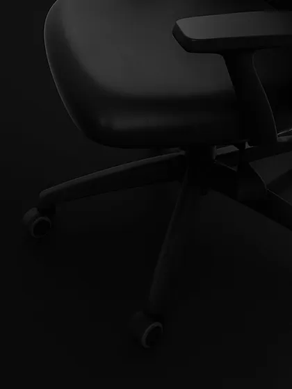 This shot highlights the sturdy five-star base and smooth-rolling casters of our task chair. This foundation provides both stability and effortless mobility, allowing you to move around your workspace with ease.