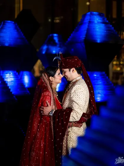 A moment of quiet connection amidst the vibrant energy of the wedding day. I use creative lighting to craft dramatic and intimate portraits that feel like a scene from your own love story.