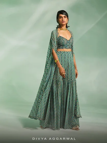 A full view of our green printed lehenga set, an easy-to-wear style that doesn't compromise on glamour.