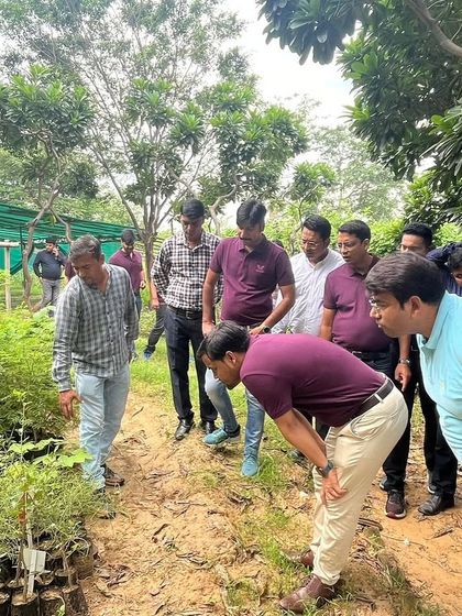 New recruits from Valvoline Cummins get a close look at the native saplings growing in our nursery, part of their company's sustainability induction.