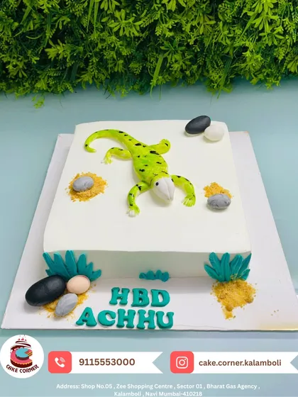 A unique lizard-themed cake for Achhu's birthday. This fun and quirky design is perfect for a kid who loves reptiles.