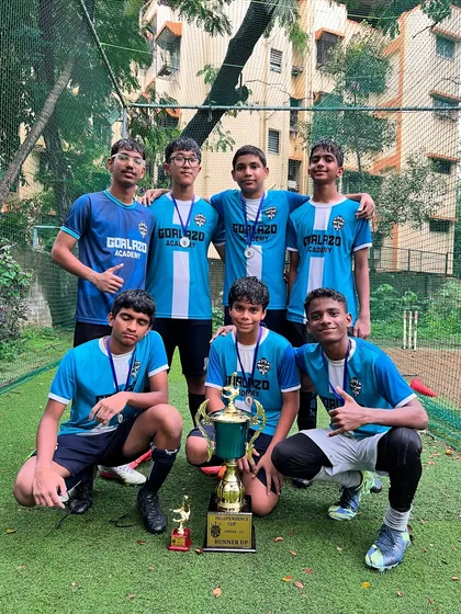 The full U-15 squad posing with their Runners-Up trophy and medals from the Independence Day Cup 2025.