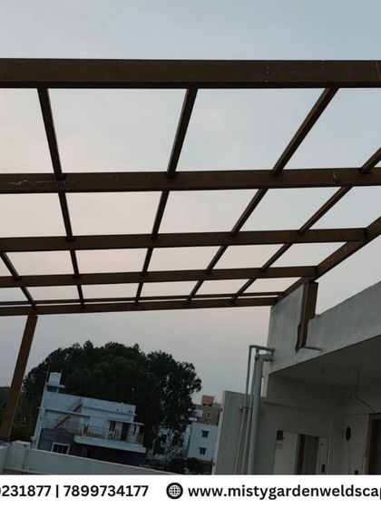 Modern metal fabrication in progress. This image shows the raw, unpainted metal frame of a pergola, highlighting the clean welds and strong joints that form the basis of a quality structure.