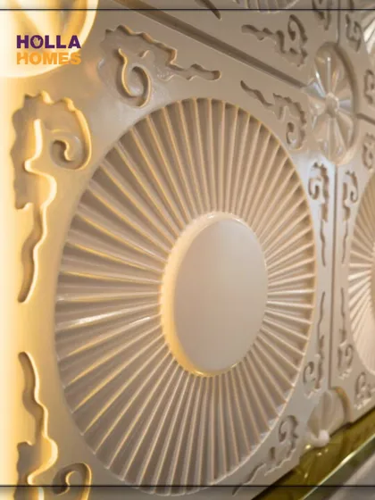 The detailed craftsmanship of the custom wall panel behind the bed in our Parisian-themed room. This 3D panel adds texture and a unique focal point, enhanced by soft backlighting.