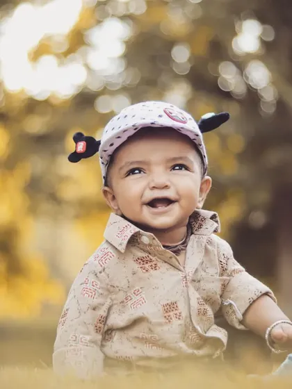 This is the kind of pure, uncontainable joy I love to capture. An outdoor portrait session like this gives little ones the freedom to be themselves, resulting in genuine smiles and memories you will treasure forever. This is a perfect example of a kids milestone portrait.