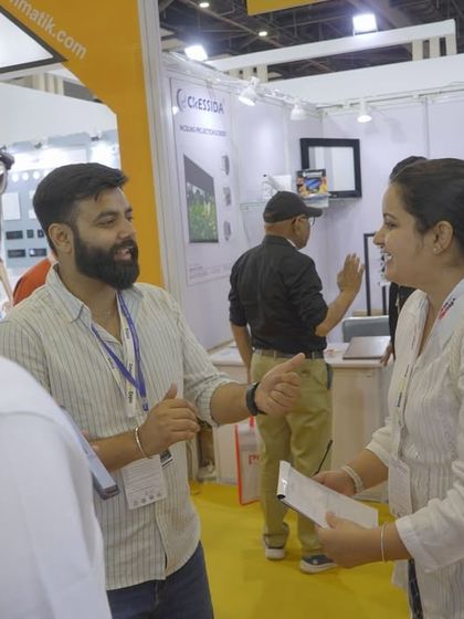 Exhausted but exhilarated. Here I am with a visitor at our expo booth, sharing the passion and technology behind SmarDen.