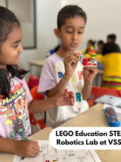 Students at VSS-BSK collaborate on a project, sharing ideas and building together. Our after-school programs are designed to enhance teamwork and creative problem-solving.