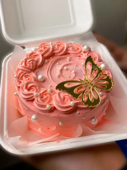 This pink bento cake with a delicate butterfly is one of my most popular designs. It shows how even a small cake can be elegant and beautiful.