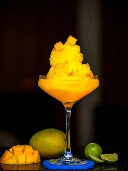 A taste of tropical bliss. Our Mango Margarita is a refreshing and fruity cocktail, perfectly crafted to transport you to a summer paradise with every sip.