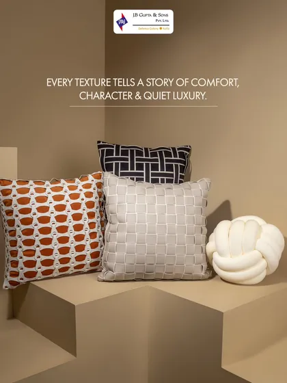 A home's comfort is in the details. This collection of designer cushions, featuring a knotted pillow and textured basket-weave covers, adds character and a touch of quiet luxury to any living space.