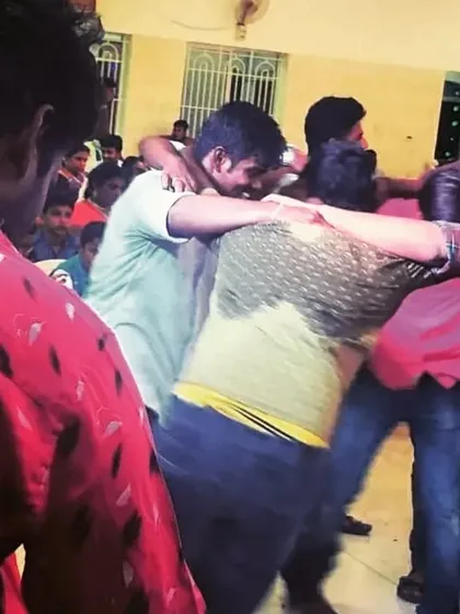 That moment in the night when everyone comes together for a group dance. Pure joy and celebration captured in one frame.