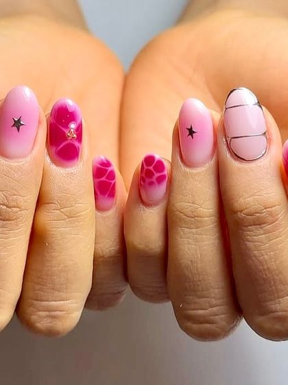 Pink perfection with a festive twist. This set features a mix of pink shades with abstract patterns, star details, and fine silver lines.