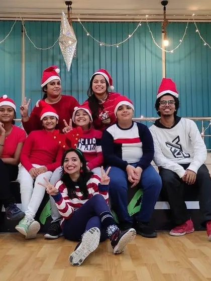 Another happy group photo from our Christmas celebration, filled with smiles and Santa hats. We love making the holidays special for our students.