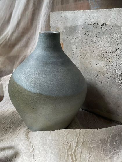 A few of my favorite finished vases from a recent collection, featuring a variety of glazes, painted details, and forms. Each one has its own personality.