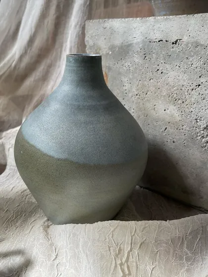 A few of my favorite finished vases from a recent collection, featuring a variety of glazes, painted details, and forms. Each one has its own personality.