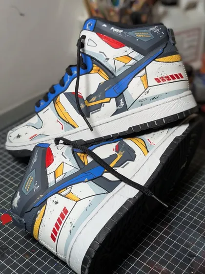 This custom Strike Freedom Gundam on a Nike Dunk High is one of the most detailed pieces I've ever done. It features a custom-built swoosh and battle-worn effects to make it look like it just walked off a battlefield. This is the level of detail I bring to every project.