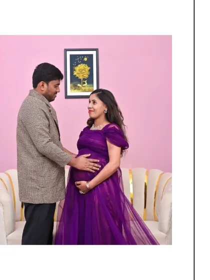 An elegant couple's pose in our modern studio setting. The rich purple of the gown provides a beautiful pop of color, and the interaction between the couple is full of warmth.