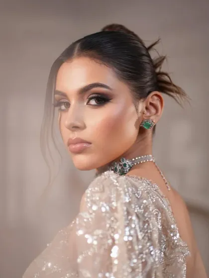 An artistic, soft-focus shot. This styling choice creates a dreamy and ethereal mood, perfect for a high-fashion editorial.