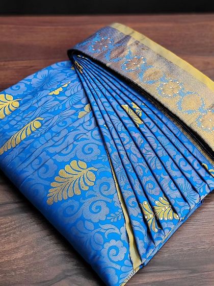 Student work from my pre-pleating class, showcasing two different sarees they have folded.