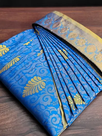 Student work from my pre-pleating class, showcasing two different sarees they have folded.