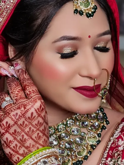 A close-up of my Barbie Doll bride's glittery eye makeup and bold red lips. This is a classic combination that never fails.