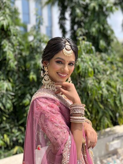 Subtle elegance that enhances, not hides. This soft pink look is perfect for a daytime sangeet or an evening cocktail party, offering a fresh and radiant glow.