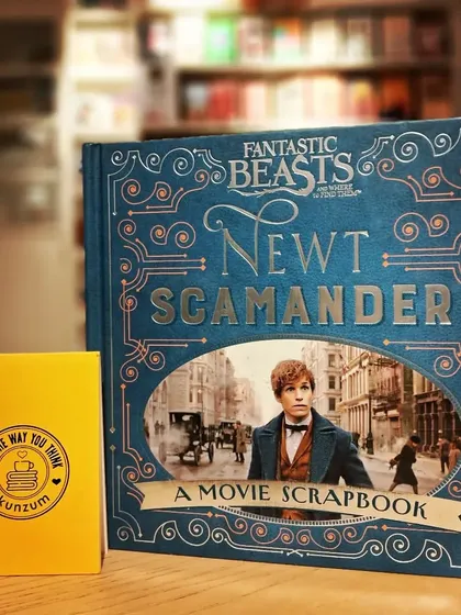 The 'Fantastic Beasts: Newt Scamander Movie Scrapbook' is a must-have for fans, filled with removable extras and behind-the-scenes details.
