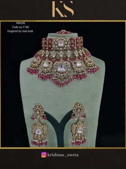 The same real-look inspired Kundan set, available with deep ruby red beads for a traditional bridal look.