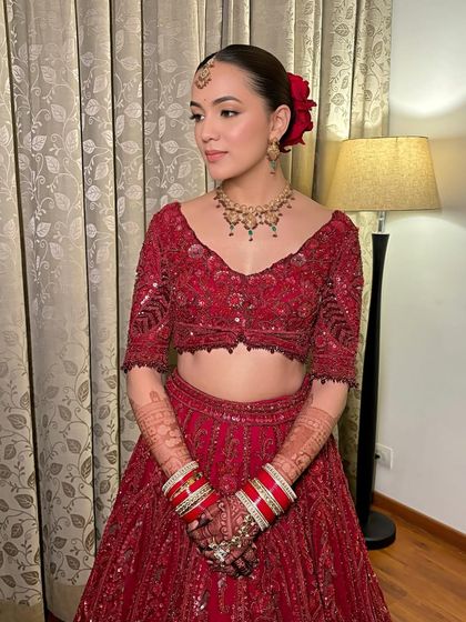 The side profile of Simran's look, showcasing the beautiful simplicity of her makeup and hair.