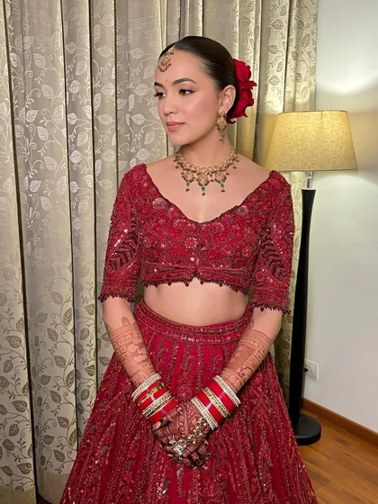 The side profile of Simran's look, showcasing the beautiful simplicity of her makeup and hair.