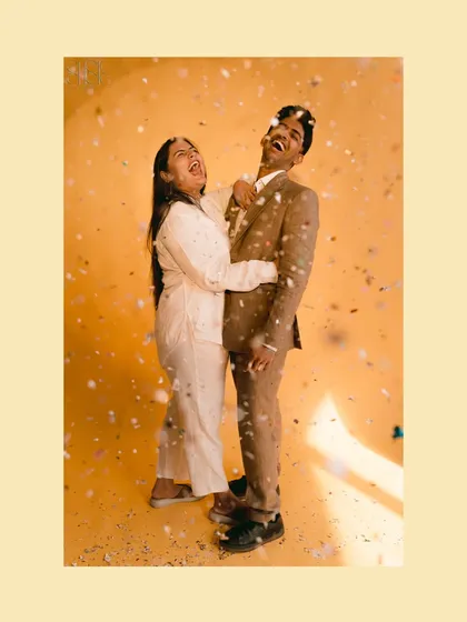 A burst of confetti and laughter. Studio shoots can be full of energy and fun, and this shot perfectly captures that celebratory feeling.