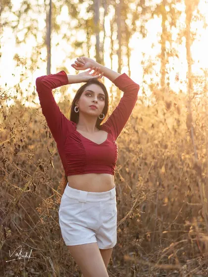 There is nothing like the magic of golden hour. We ventured into a wooded area to catch the last rays of sun, creating this warm and dreamy portrait that feels both natural and cinematic.