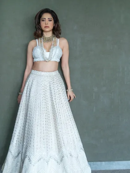 An ethereal all-white lehenga I styled for Nushrratt Bharuccha. This look is perfect for a day wedding or a reception, proving that white can be incredibly festive.