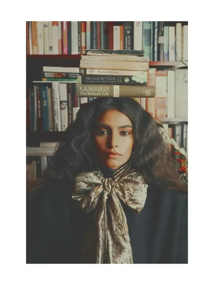 From my personal editorial project, "Roots." This image explores the concept of our intellectual and cultural foundations. Visual storytelling for me is about finding unconventional ways to represent abstract ideas, like balancing books to symbolize the weight and support of knowledge.