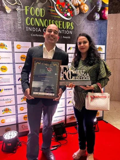 This award is a testament to the power of collaboration and determination. Posing with our 'Best Caterer' trophy.