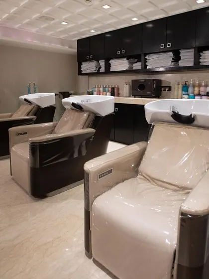 Our state-of-the-art hair wash stations are designed for maximum comfort, allowing you to fully relax and enjoy our rejuvenating scalp massages and treatments.