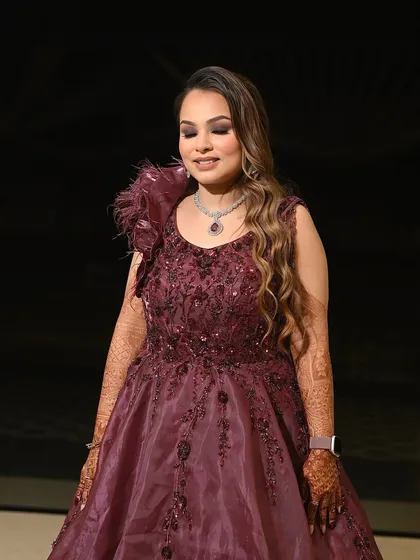 Bold and beautiful, this engagement makeup look speaks volumes. For Mitali, we created a dramatic eye and paired it with a sophisticated gown for a truly show-stopping appearance.