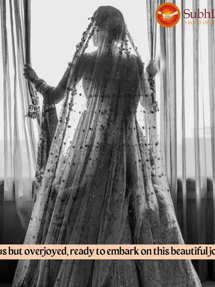 A bride, seen through her veil, looks out a window in a moment of quiet reflection before her wedding. We are here to support our clients through all the emotions of the wedding journey.