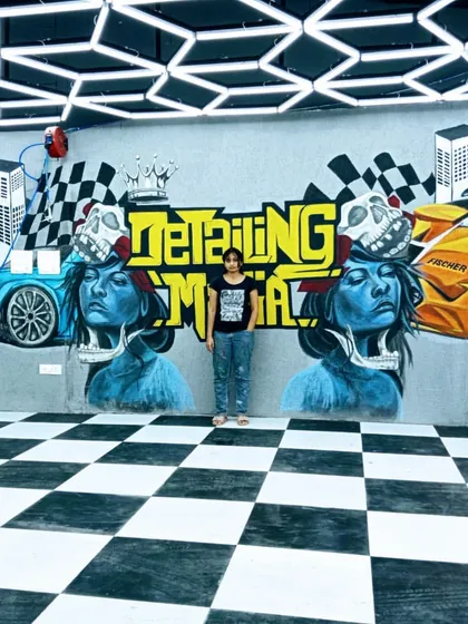This was a huge and exciting project for a luxury car garage. I used spray paints to create this 27-foot wide graffiti mural with a sporty, automotive theme. Working on a rough surface is always a challenge, but the final result is full of energy.