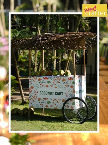 A fun and refreshing coconut cart, part of the Malabari-themed Haldi, offering a cool treat to guests in a stylish way.