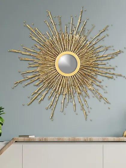 Our bestselling Sunburst mirror is a unique and mesmerizing piece of art. The central mirror is surrounded by beautiful metal sun rays, creating a statement piece that radiates energy and style.