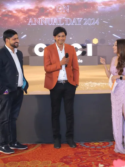 Interacting with employees on stage during the CINDA Annual Day. I use interactive games and segments to make corporate events fun and engaging, helping to boost team morale.