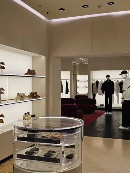 Inside the Valentino store, the product is the hero. We designed brightly lit, recessed shelving to display bags and accessories like works of art, ensuring each piece is given its own space to shine against a clean, neutral backdrop.