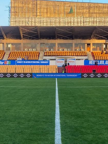 A view from the halfway line showing the extensive perimeter and stand branding we implemented for the Women's Tri-Nation tournament.