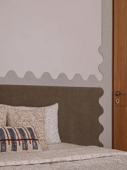 A collection of views from the Rehethaan project, showcasing the daughter's bedroom with its unique glass brick wall, the guest bedroom, and the master bedroom with its layered headboard design.