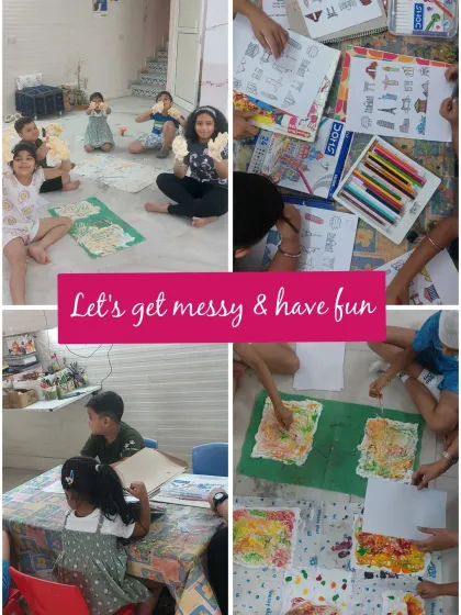 Getting messy is part of the fun. Here, the kids are using a shaving cream marbling technique to create unique textures for their monument-themed artwork.