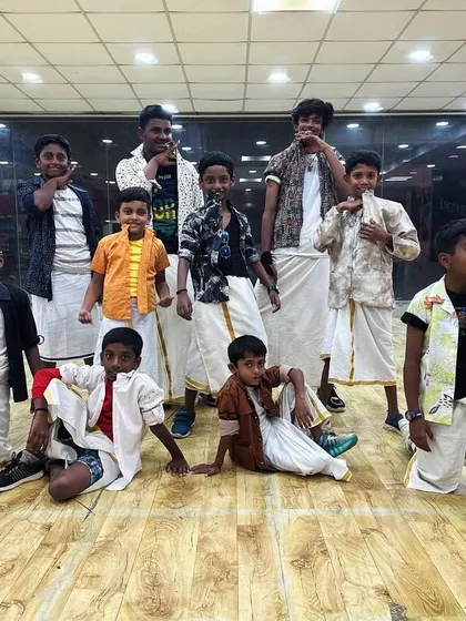 Getting our young gangsters ready for a performance. We work on everything from folk dance steps to stage presence and expressions.
