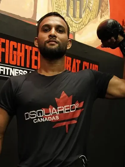 This is the look of a fighter who has put in the work. Proud, strong, and ready for anything.